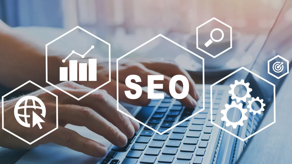 A person typing on a keyboard with SEO-related icons displayed, symbolizing SEO strategies.